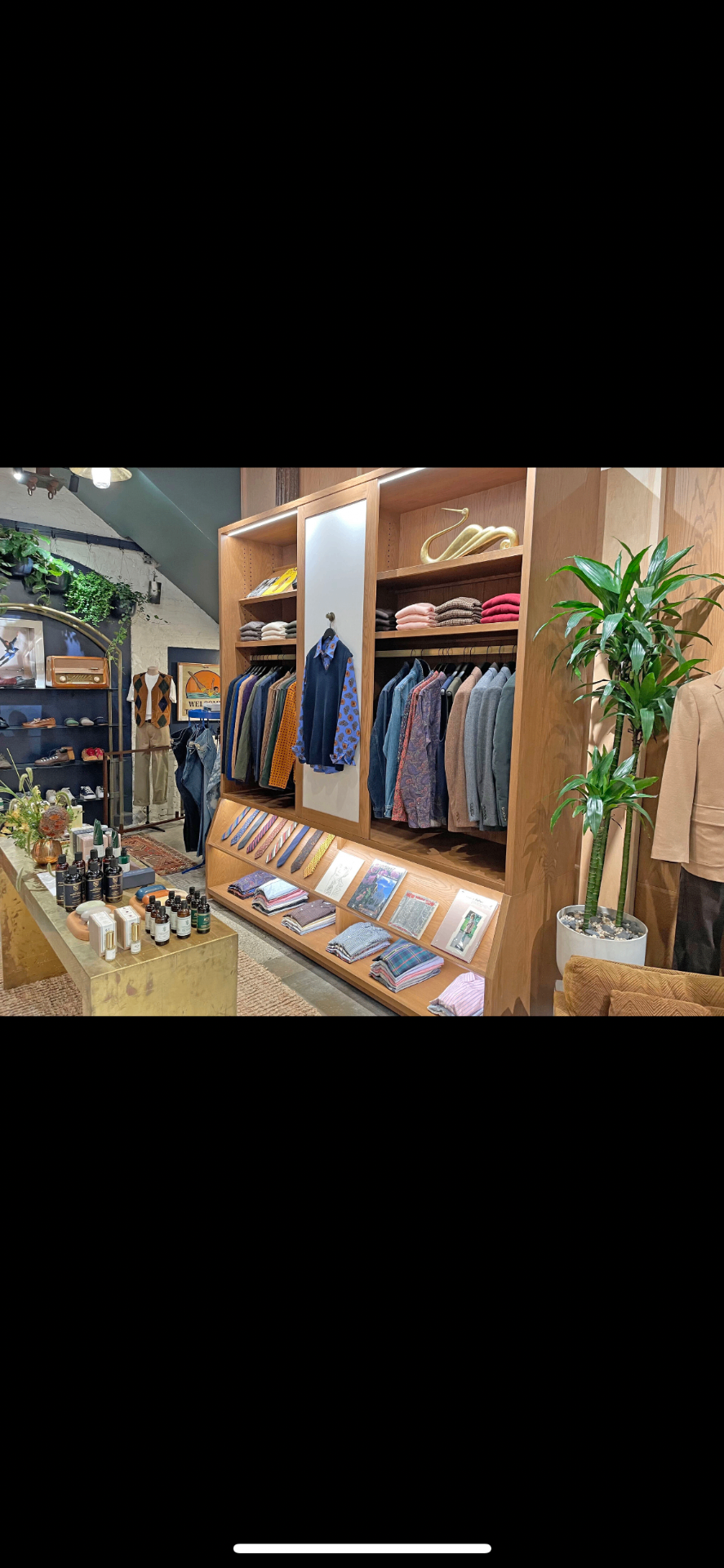Oak shelving menswear display