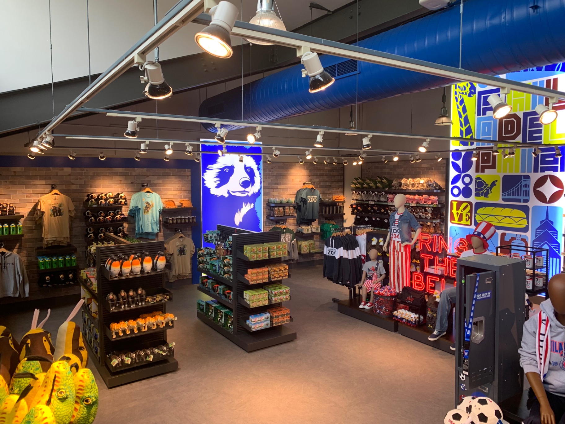 Panda mural anchoring the retail space